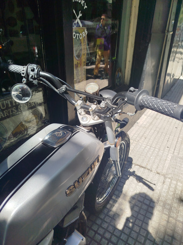 Suzuki Ax 100