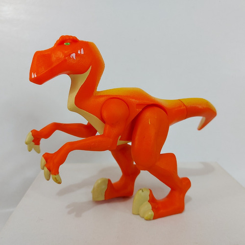 Figura Imaginext Dinosaurio Raptor Naranja 12x15cm