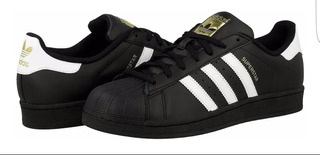 conchas adidas negras con blanco