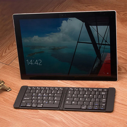 Mini Teclado Plegable Inalámbrico Bluetooth Portátil De Viaj