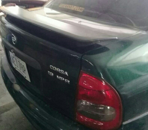 Imagen 7 de 10 de Spoiler Para Maleta Gm Original Aveo Corsa Optra 4 Puertas
