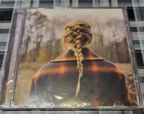 Lote de 2 discos de Taylor Swift - Evermore [vinilo verde] y folclore  [vinilo beige]