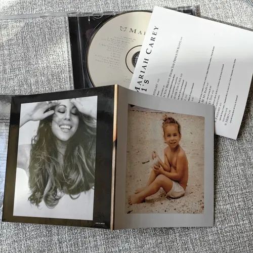 マライア・キャリー フォトブック Mariah Carey #1's - 2cd Éxitos + Libro Fotos Y Letras
