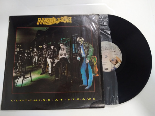 Marillion Cluthing At Straws Lp Vinilo 1987 Emi Excelente 