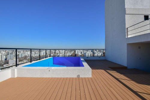 Semipiso De Dos Dormitorios, Balcon Y Cochera.