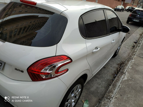 Imagem 8 de 13 de Peugeot 208 2014 1.5 Active Flex 5p