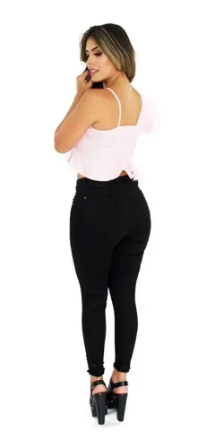 Jeans negro roto 2025 en la rodilla mujer