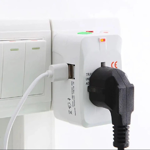 Adaptador Universal Para Viaje 2 Entradas Usb Enchufe 220v