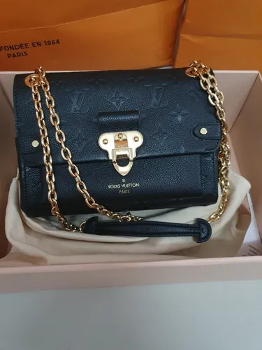 cuanto vale una cartera louis vuitton original