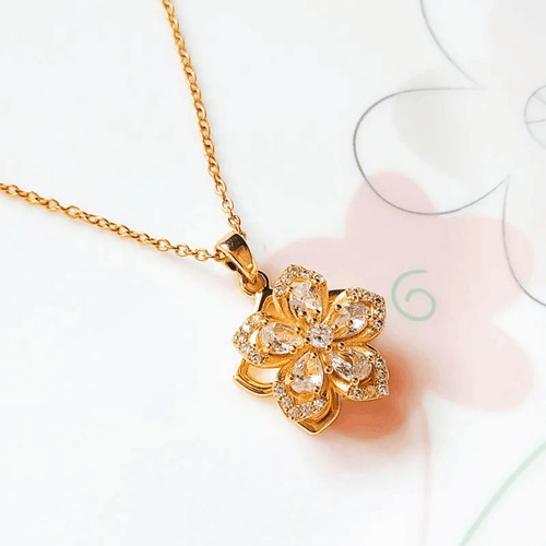 Imagen 2 de 6 de Collar Mujer Dije Flor Giratorio Cristales Dorado Acero Inox