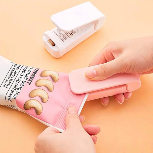 Imagen 4 de 7 de Sellador De Bolsa De Plastico Mini A Pila Portatil Con Iman
