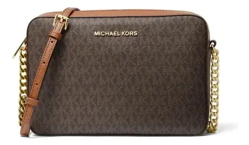 Bolsa Michael Kors Jet Set Travel Marrom | Parcelamento sem juros