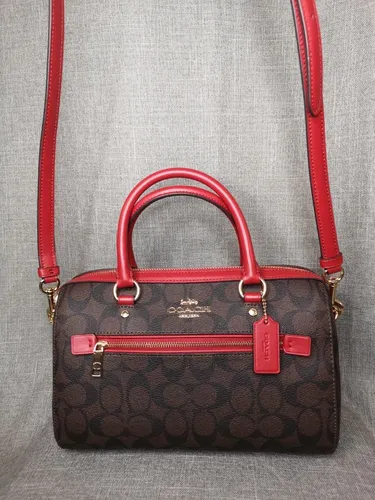Bolsa coach cafe con rojo sale