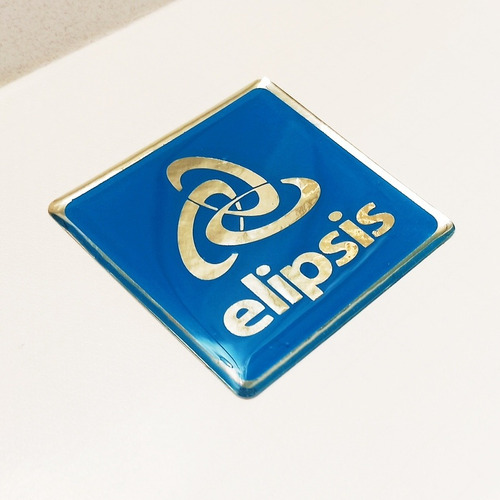 Elispsis, Logo, Emblema Ploteado Y Encapsulado Azul Y Cromo
