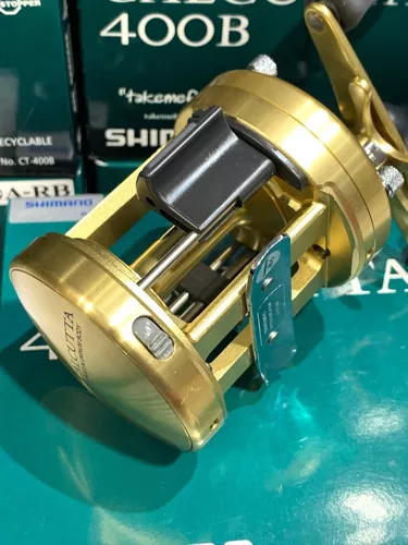 Reel rotativo Shimano Calcutta B CT400B derecho color dorado