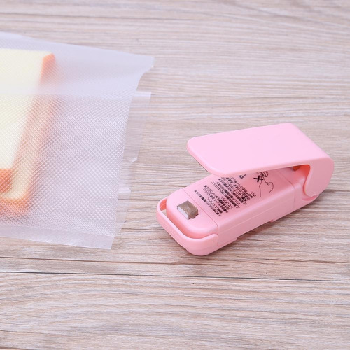 Imagen 2 de 7 de Sellador De Bolsa De Plastico Mini A Pila Portatil Con Iman