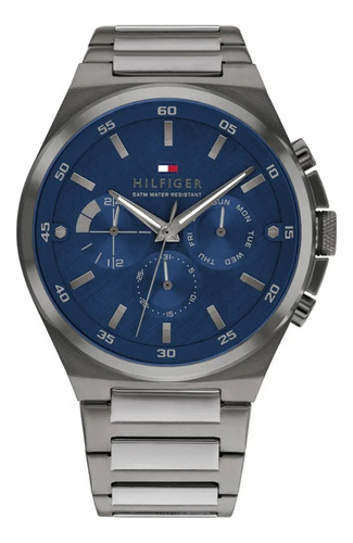 Reloj de pulsera Tommy Hilfiger 1792089, analógico, para hombre, fondo azul, con correa de acero inoxidable color gris, agujas color gris, bisel color azul y mariposa