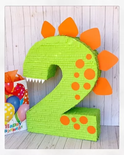 Piñata de dinosaurios para cumpleaños.