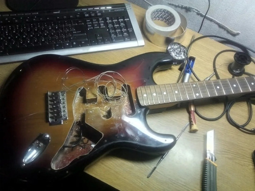 Imagen 5 de 10 de Reparación Y Calibración De Guitarras Acústicas Y Eléctricas