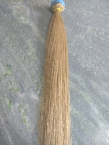 Imagem 2 de 5 de Cabelo Humano Loiro Fita Adesiva Inteira 50g 55cm Mega Hair