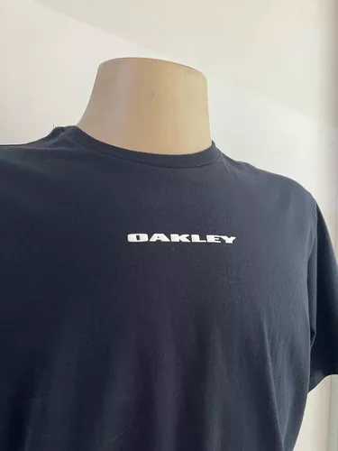 OAKLEY Camiseta masculina cinza mescla estampa preta caveira G - Second  Hand / Brecho