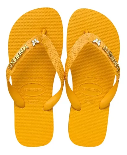 Havaianas Top com escrita dourada e borboleta branca