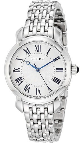 Reloj pulsera Seiko Essentials SUR629 de cuerpo color plateado, analógico, para mujer, fondo blanco, con correa de acero inoxidable color plateado, agujas color azul, dial azul, minutero/segundero negro, bisel color plateado y desplegable