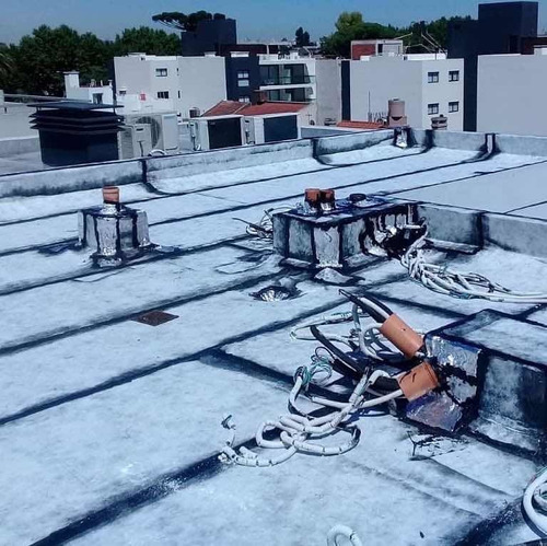 Imagen 3 de 5 de Colocación De Membrana Con Geotextil Transitable.