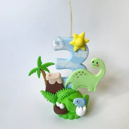 Vela de cumpleaños de dinosaurio.