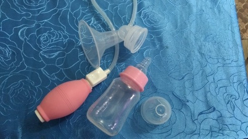 Extractor De Leche Materna Manual Con Bomba Rosado Con Chupo