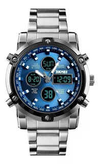 Reloj pulsera Skmei 1389 de cuerpo color plateado, analógico-digital, para hombre, fondo azul, con correa de acero inoxidable color plateado, agujas color blanco y gris, dial azul y blanco, subesferas