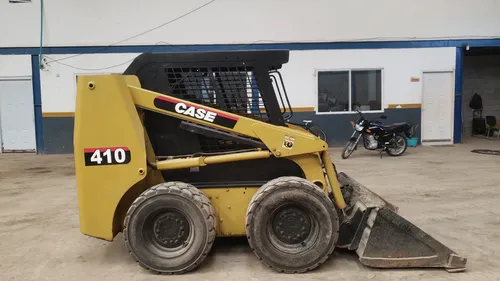 Mini Cargador Case 410 Modelo 2005