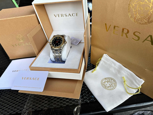 Reloj Versace Greco Plata Con Dorado Y Fondo Negro