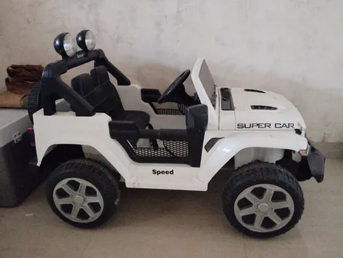 Carros electricos para niños usados store