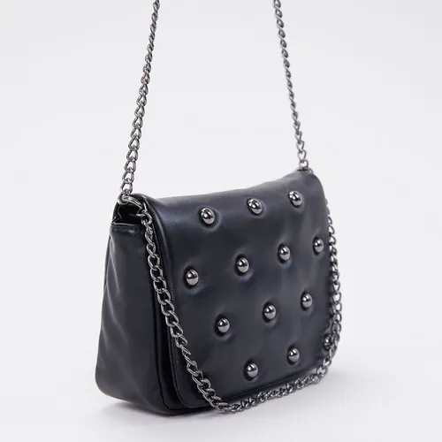 Bandolera con tachas sale