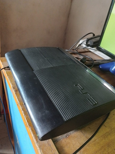 Playstation 3 Super Slim Sony 150gb Negra + Joystick Negro (Usado)