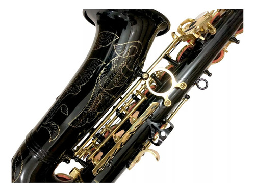 Saxofón Alto Silvertone Slsx020 Negro Llaves En Dorado Color Negro Laqueado