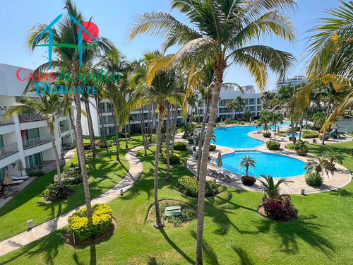 Cad Mayan Lakes 16 302. Amplia Terraza Con Vista A Las Áreas Comunes Y Acceso A Un Exclusivo Club De Playa