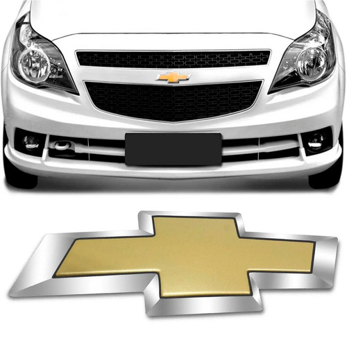 Emblema Gravata Dourada Grade Dianteira Chevrolet Agile 2012