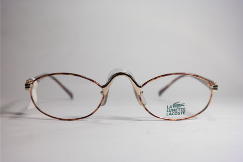 Marco Lentes Óptico Lacoste 703 Elegant Oval Brown Gold 51mm