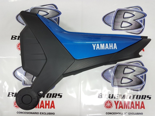 Cacha Bajo Asiento Yamaha Sz150r Izq Celeste 