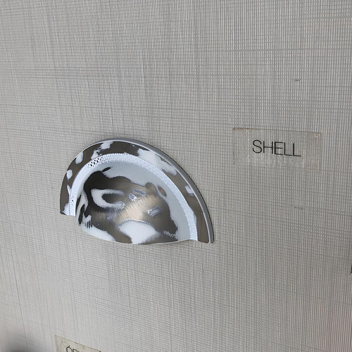 Puxador Shell 64mm Vecchio Bianco Zen