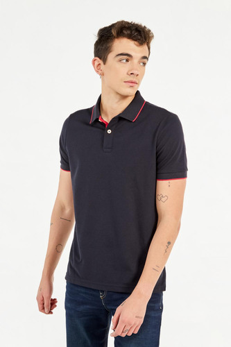 Camiseta Polo Unicolor Con Tejido En Cuello Y Puños