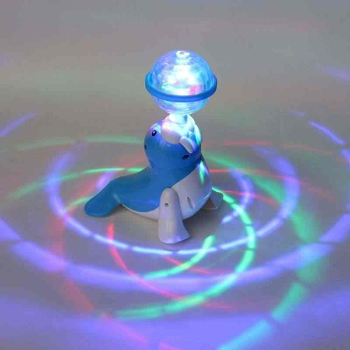 Juguete Didactico Lobo Marino Musical Con Esfera De Luz Bebe