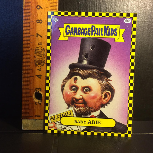  Garbage Pail Kids Baby Abie Año 2011, Borde Cuadriculado