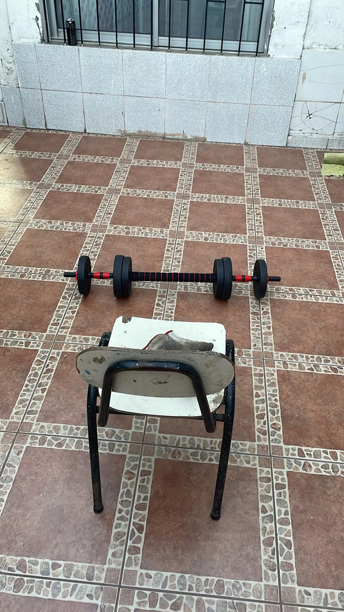 Set de mancuernas y barra Overfit 15 kg, foto de cliente