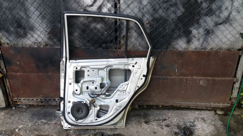 Imagen 2 de 2 de Vendo Motor De Puerta Trasera Derecha De Nissan Tiida