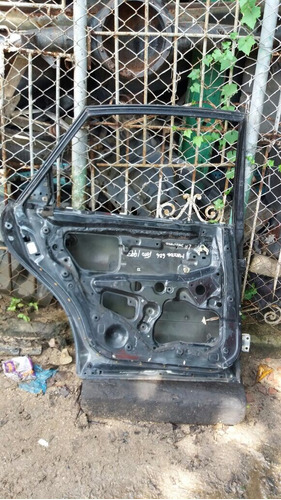 Vendo Puerta Trasera Izquierda De Mazda 626, Año 1993