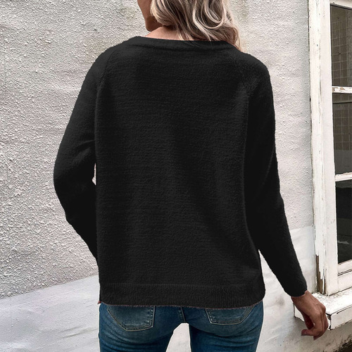 Una Blusa Tipo Cárdigan De Manga Larga Con Estampado De Patc