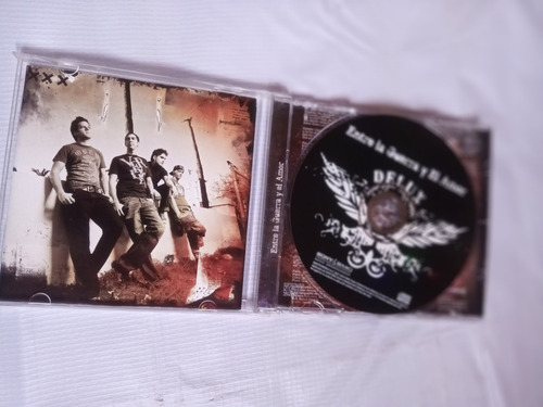 Delux Entre La Guerra Y El Amor Disco Compacto Original (Usado)